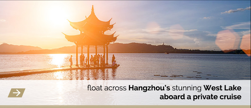 float across Hangzhou's stunning West Lake aboard a private cruise